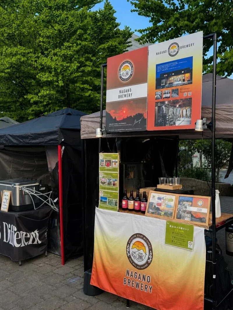 Nagano Brewery thanks visitors at the 'Yoi Fes' in front of Iida Station