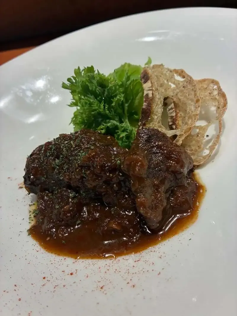 Brasserie SOMAで「いつとせスパイスエール」を使った猪肉煮込みを案内