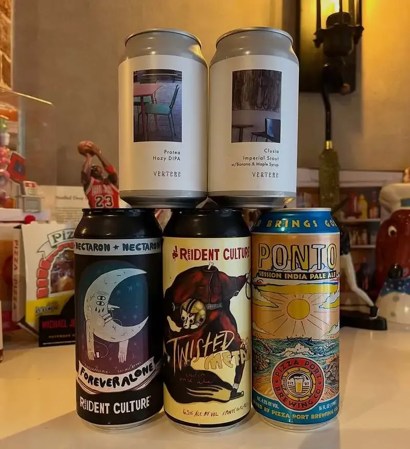 Four guest cans from UCHU BREWING and 8 Bit Brewing Company at SUPER PIZZA