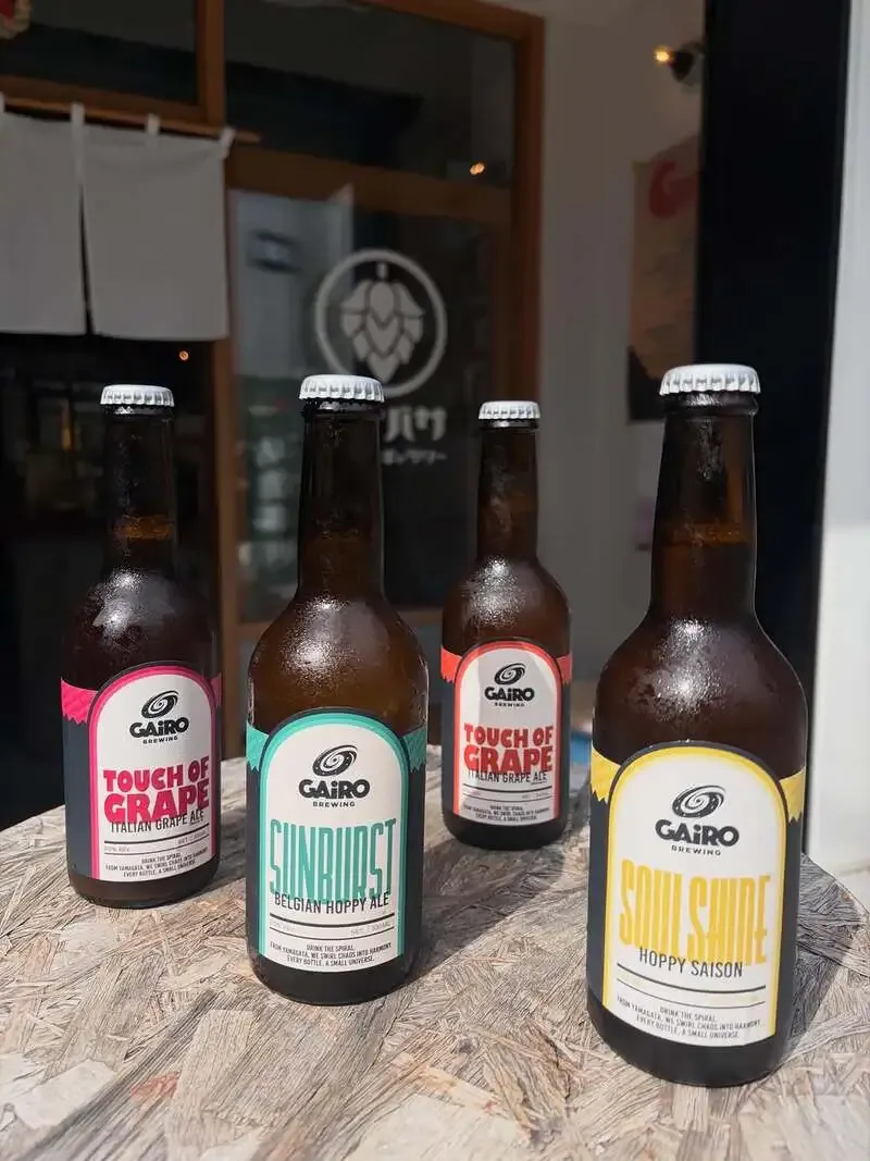 Four new beers from GAiRO brewing arrive at Kamakura's VANAVASA, served on the bench outside