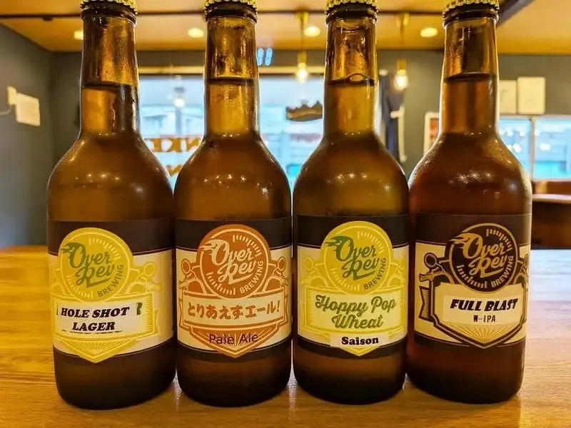 Monkey Wrench bottles four Over Rev Brewing beers