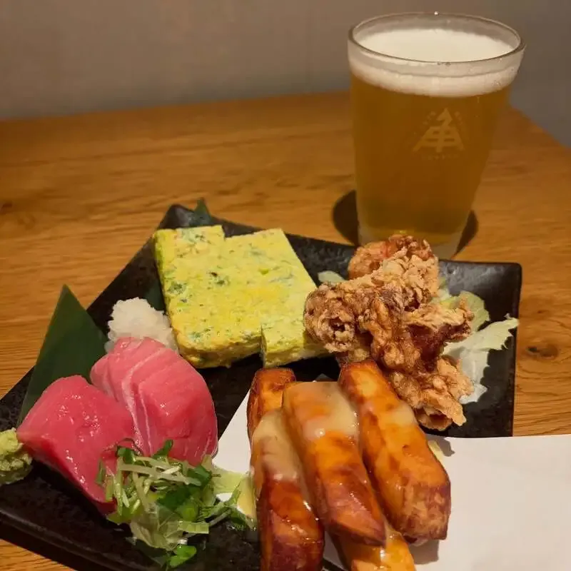 Mugibaru in Kamata pours Ise Kadoya's Meyer Lemon Radler, with Shiga Kogen IPA on tap