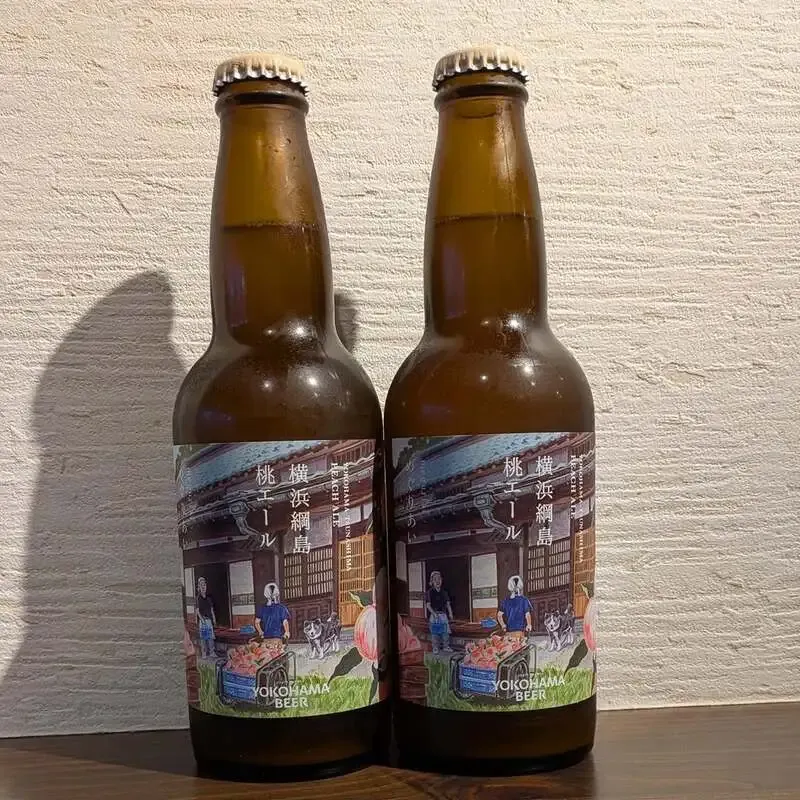 スロースハウスで箕面ビール「桃ヴァイツェン 白鳳Ver.」を樽とボトルで提供